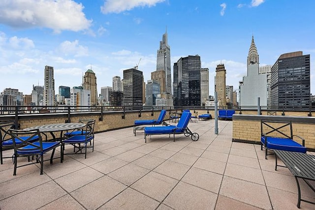 137 E 36th St Unit 11-B, New York City, NY 10016 - view of patio featuring a view of skyline