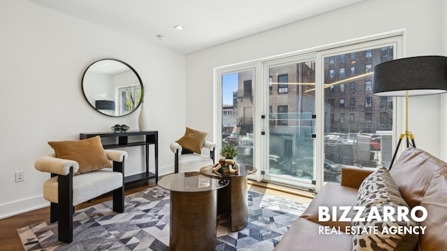 553 W 182nd St Unit 2R, New York City, NY 10033 - living area featuring wood finished floors and baseboards
