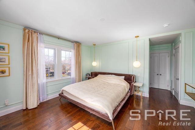 72-03 Ingram St Unit H0Use, New York City, NY 11375 - bedroom with wood-type flooring and baseboards