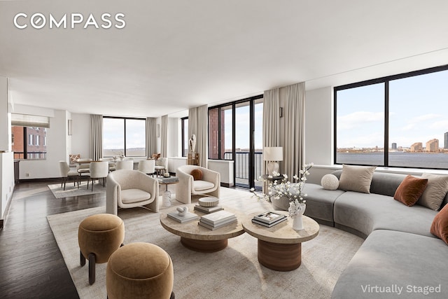 380 Rector Pl Unit 7Lmn, New York City, NY 10280 - living room with wood finished floors