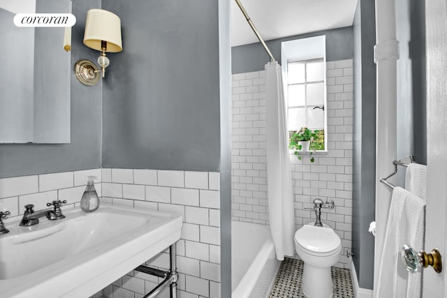 116 Pinehurst Ave Unit H14, New York City, NY 10033 - bathroom with tile walls, shower / bath combination with curtain, and tile patterned floors