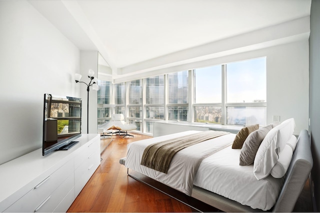 146 W 57th St Unit 53A, New York City, NY 10019 - bedroom with light wood finished floors