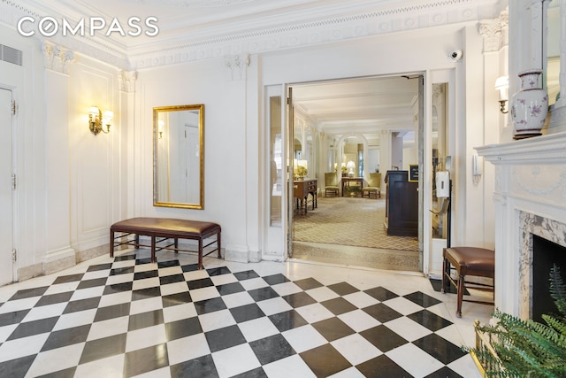hallway featuring ornamental molding