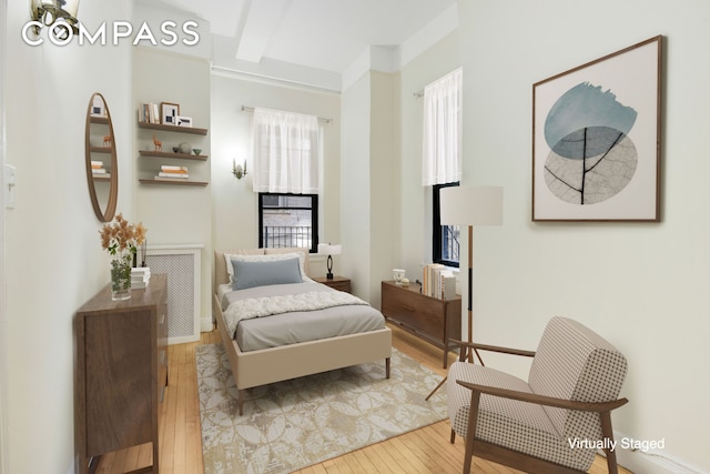 bedroom featuring hardwood / wood-style flooring