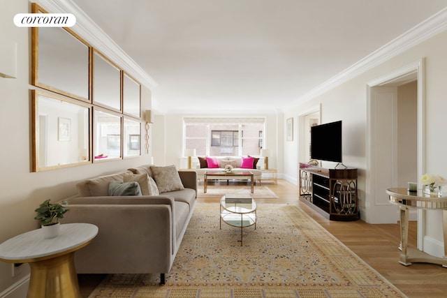living room featuring visible vents and crown molding
