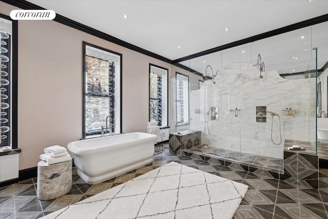 132 E 62nd St, New York City, NY 10065 - bathroom with tile patterned flooring, a shower stall, a freestanding tub, and crown molding