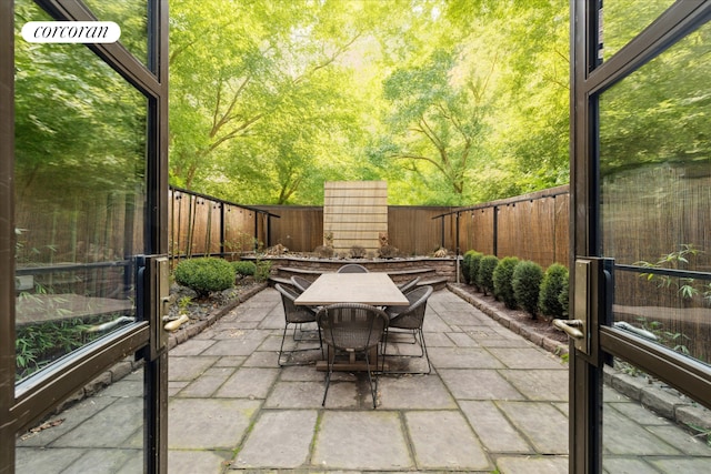 132 E 62nd St, New York City, NY 10065 - view of patio / terrace with outdoor dining space and a fenced backyard