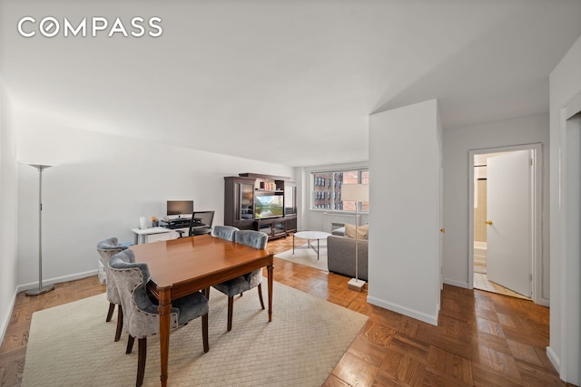 139 E 33rd St Unit 11L, New York City, NY 10016 - dining area featuring baseboards