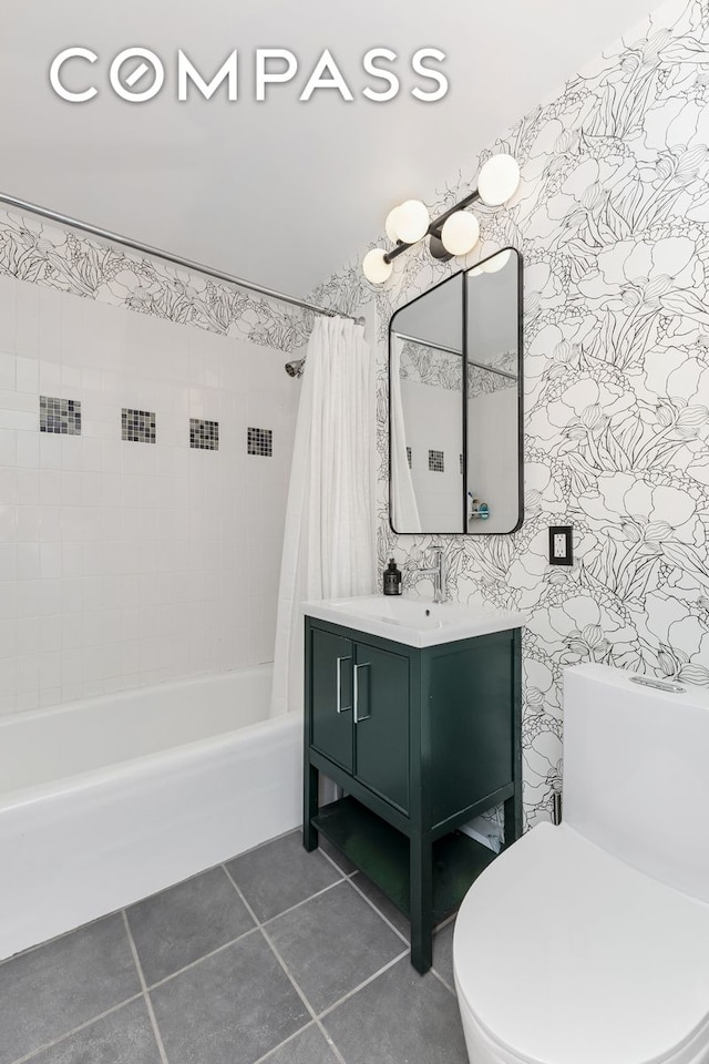 bathroom with tile patterned flooring, toilet, shower / bath combo, and vanity