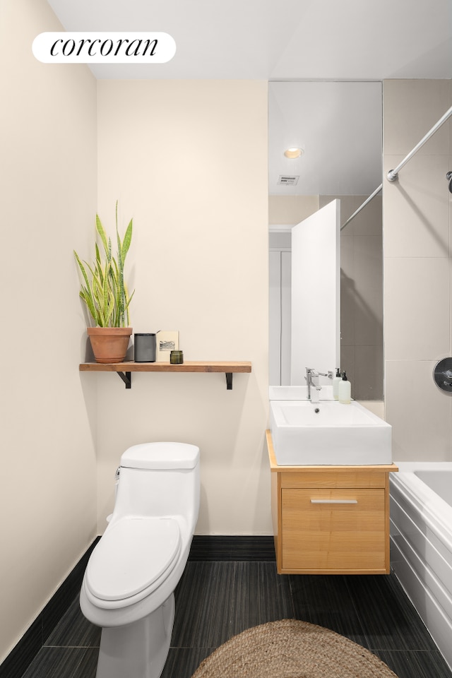 146 Clifton Pl Unit 2A, New York City, NY 11238 - bathroom with tub / shower combination, vanity, baseboards, and toilet