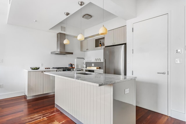 268 Cumberland St Unit 4A, New York City, NY 11205 - kitchen featuring wall chimney exhaust hood, freestanding refrigerator, a sink, dark wood-style flooring, and light stone countertops