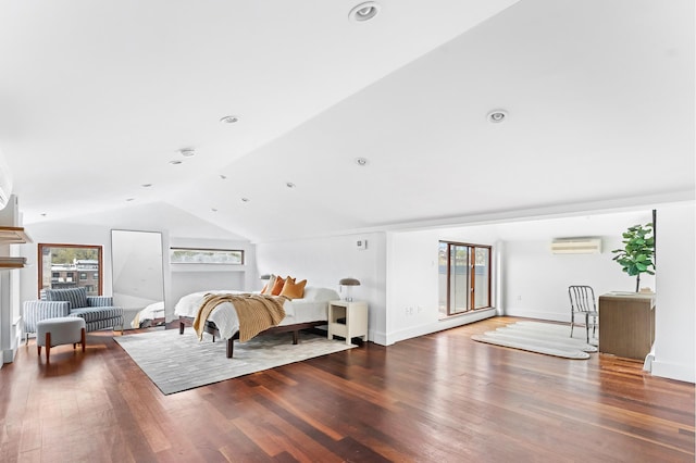 268 Cumberland St Unit 4A, New York City, NY 11205 - bedroom featuring an AC wall unit, lofted ceiling, wood finished floors, and baseboards