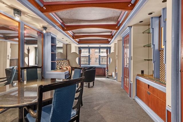 carpeted office with coffered ceiling and ornamental molding