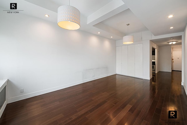 315 7th Ave Unit 16-D, New York City, NY 10001 - unfurnished dining area with wood finished floors, baseboards, and recessed lighting