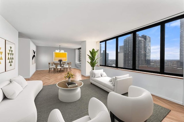 422 E 72nd St Unit 25C, New York City, NY 10021 - living area featuring a chandelier and baseboards