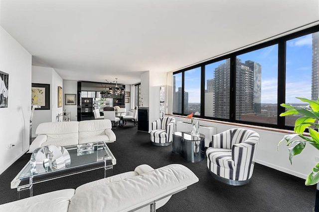 422 E 72nd St Unit 25C, New York City, NY 10021 - living room with plenty of natural light, a chandelier, and baseboards