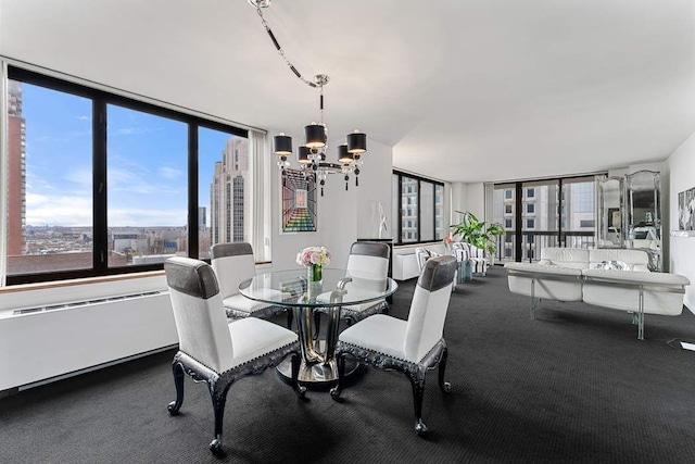 422 E 72nd St Unit 25C, New York City, NY 10021 - carpeted dining room with a chandelier, healthy amount of natural light, and a wall of windows