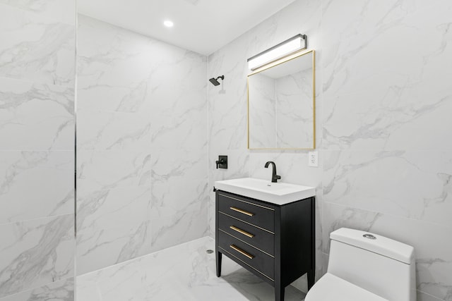 45-29 47th St Unit 2-B, New York City, NY 11377 - full bath with tile walls, toilet, vanity, and marble finish floors