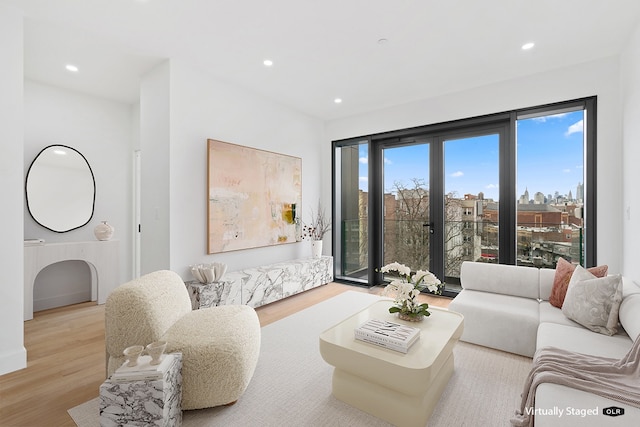 45-29 47th St Unit 3-A, New York City, NY 11377 - living room featuring wood finished floors and recessed lighting