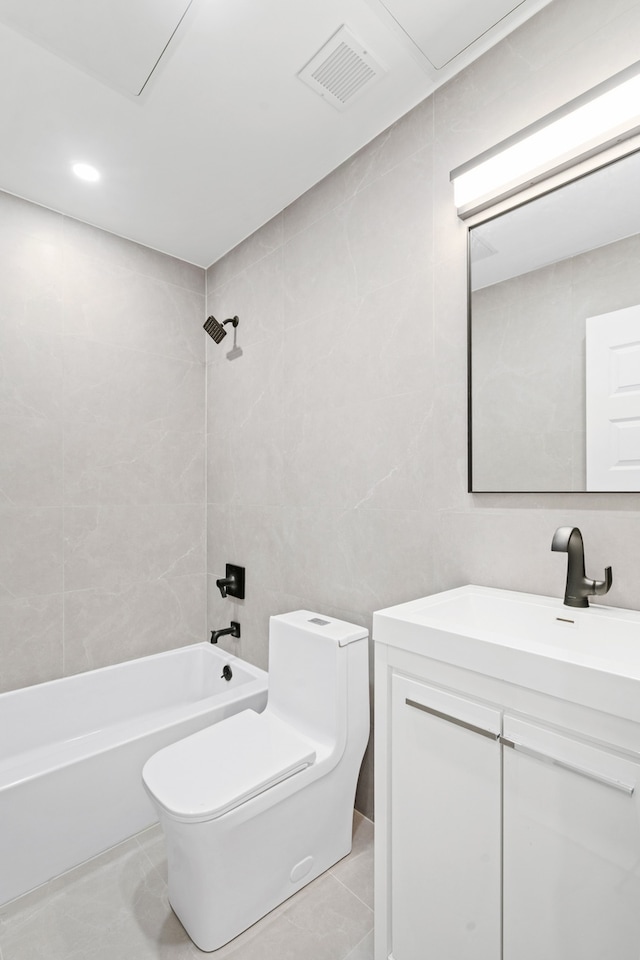 45-29 47th St Unit 3-A, New York City, NY 11377 - bathroom featuring toilet, shower / bathtub combination, tile patterned floors, tile walls, and vanity