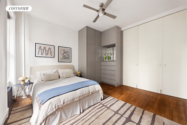 855 9th Ave Unit 1B, New York City, NY 10019 - bedroom with wood finished floors, ceiling fan, and a closet