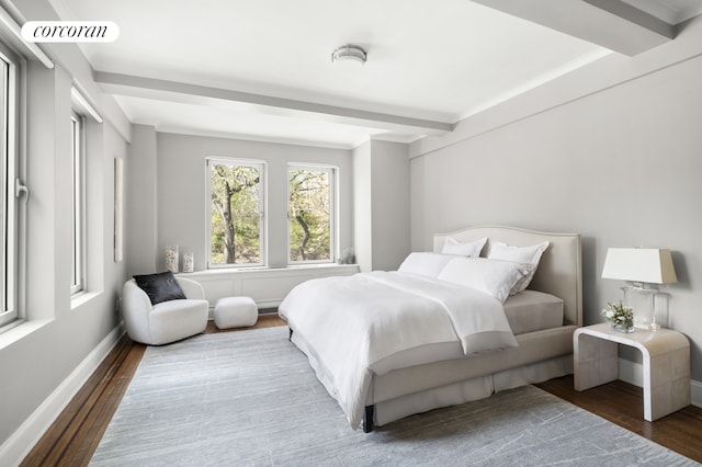 1200 5th Ave Unit 2A, New York City, NY 10029 - bedroom featuring wood finished floors, beamed ceiling, and baseboards