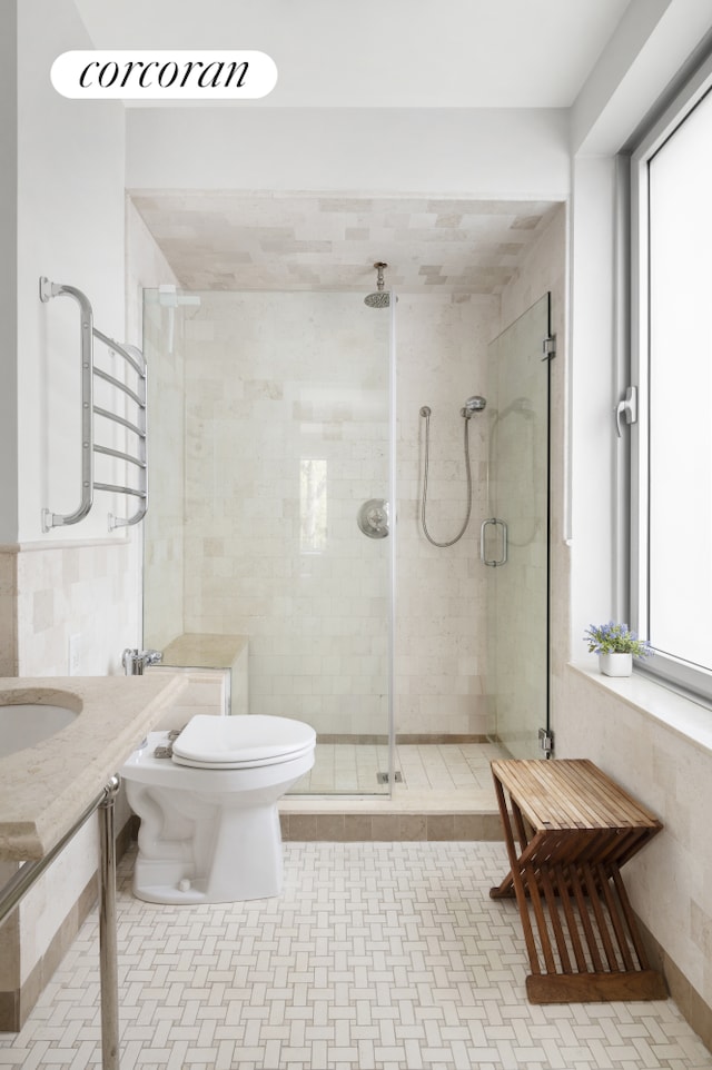 1200 5th Ave Unit 2A, New York City, NY 10029 - full bathroom with a stall shower, toilet, and a sink