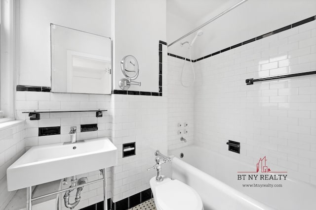 50 Riverside Dr Unit 11-F, New York City, NY 10024 - bathroom with tile walls,  shower combination, pet washing area, a sink, and toilet