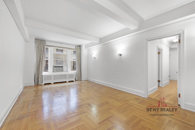 50 Riverside Dr Unit 11-F, New York City, NY 10024 - unfurnished room with radiator, cooling unit, baseboards, and beam ceiling
