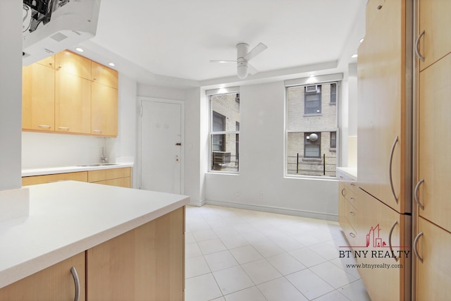50 Riverside Dr Unit 11-F, New York City, NY 10024 - kitchen featuring light brown cabinets, ceiling fan, a sink, light countertops, and recessed lighting