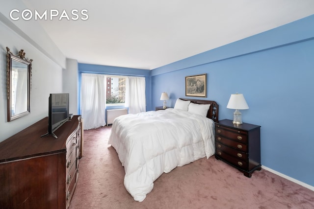 345 E 56th St Unit 5C, New York City, NY 10022 - bedroom featuring light colored carpet