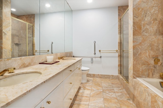 full bathroom with recessed lighting, a sink, and a stall shower