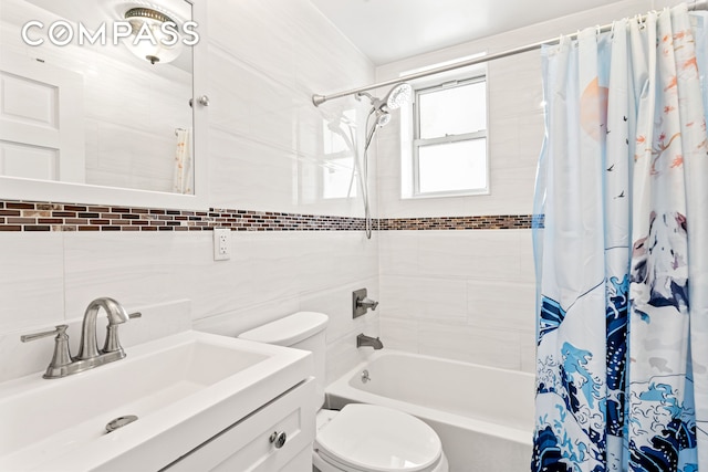 65-33 38th Ave Unit 5, New York City, NY 11377 - bathroom featuring shower / bath combination with curtain, toilet, vanity, and tile walls