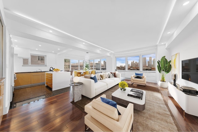45 Sutton Pl S Unit 11K, New York City, NY 10022 - living area with recessed lighting and dark wood-style flooring