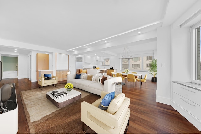 45 Sutton Pl S Unit 11K, New York City, NY 10022 - living area featuring recessed lighting, dark wood-type flooring, beamed ceiling, and baseboards