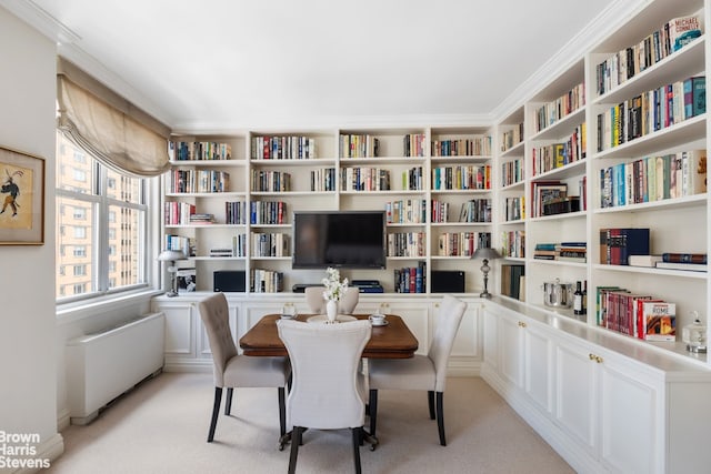 175 E 62nd St Unit 8B, New York City, NY 10065 - office area with light colored carpet, bookshelves, and crown molding