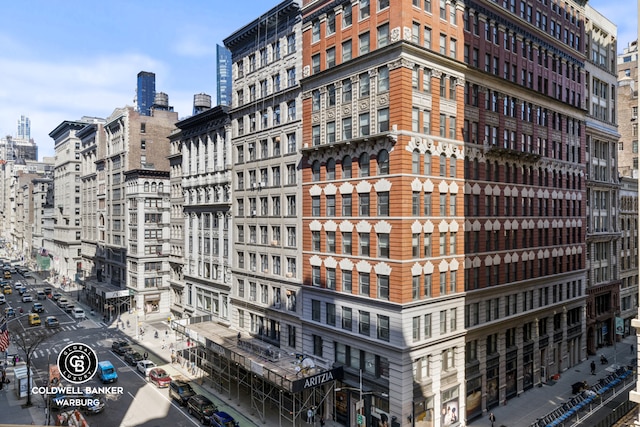 view of building exterior featuring a city view