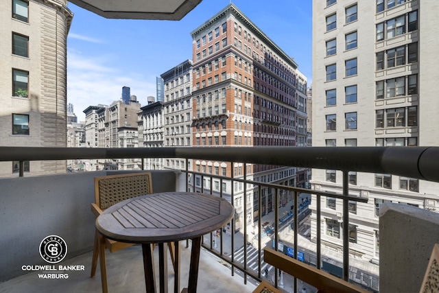 balcony featuring a view of city