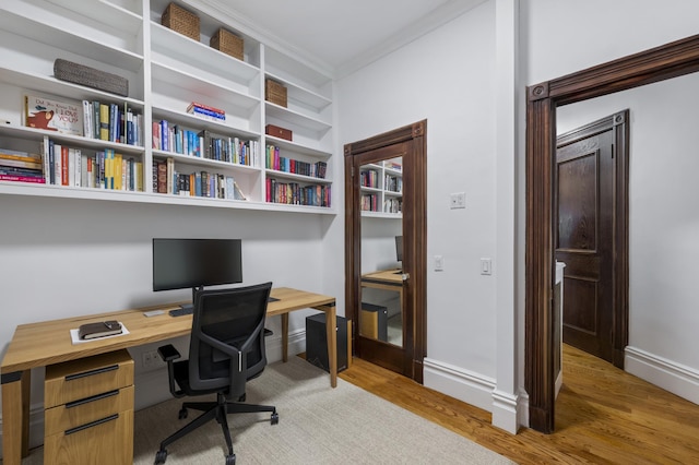 120 E 85th St Unit 2-E, New York City, NY 10028 - office featuring light wood-style flooring, ornamental molding, and baseboards