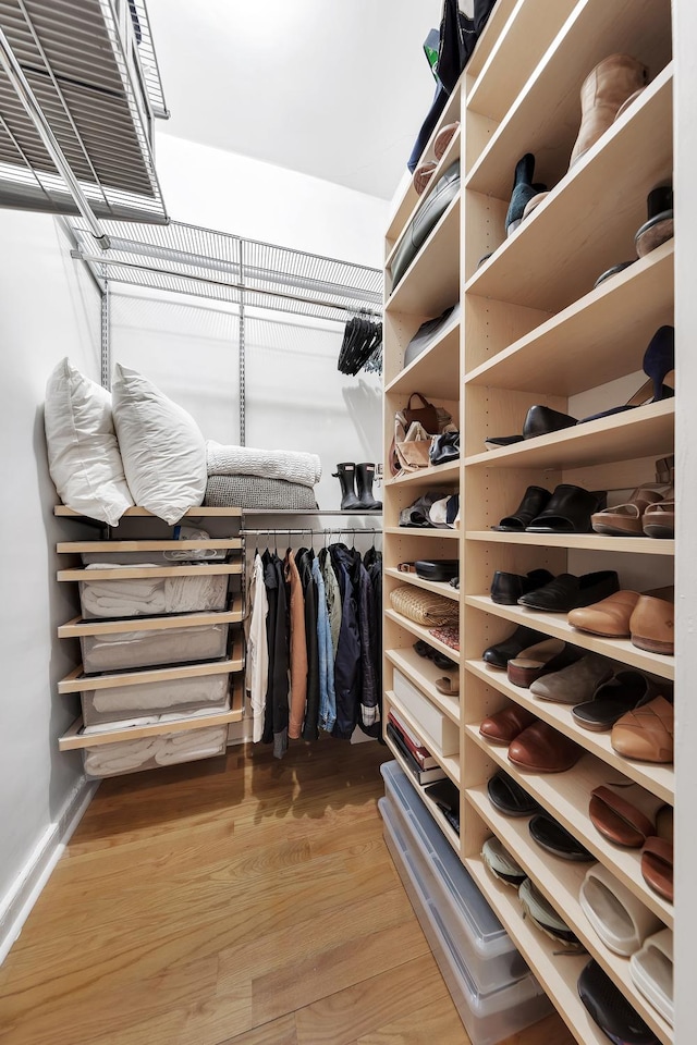 120 E 85th St Unit 2-E, New York City, NY 10028 - walk in closet featuring wood finished floors