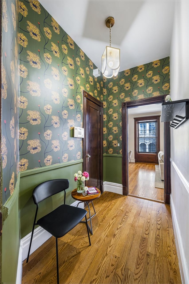 120 E 85th St Unit 2-E, New York City, NY 10028 - hallway featuring wood finished floors and wallpapered walls