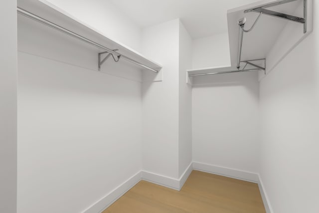 200 Amsterdam Ave Unit 7B, New York City, NY 10023 - spacious closet featuring light wood-style floors