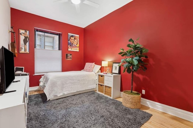 229 W 97th St Unit 1E, New York City, NY 10025 - bedroom with baseboards, a ceiling fan, and wood finished floors