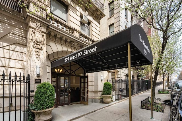 229 W 97th St Unit 1E, New York City, NY 10025 - exterior space with fence, french doors, and stone siding