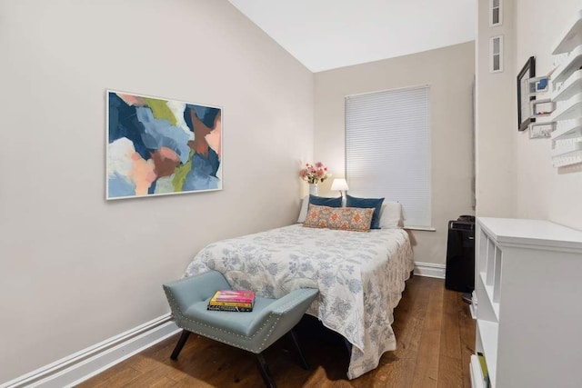 229 W 97th St Unit 1E, New York City, NY 10025 - bedroom with baseboards, dark wood-type flooring, and visible vents