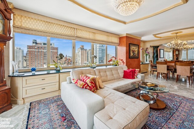 422 E 72nd St Unit 28D, New York City, NY 10021 - living room featuring a chandelier, a view of city, ornamental molding, light marble finish floors, and a tray ceiling