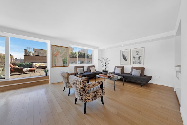 living room featuring recessed lighting and light wood-type flooring