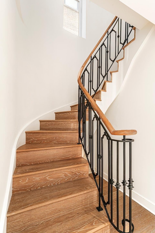 27 E 79th St Unit Duplex7/8, New York City, NY 10075 - stairs featuring wood finished floors and baseboards