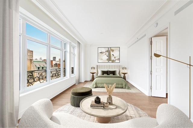 27 E 79th St Unit Duplex7/8, New York City, NY 10075 - bedroom with crown molding, wood finished floors, and baseboards