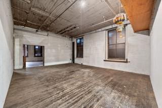 empty room with wood finished floors